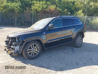 2020 Jeep Grand Cherokee Laredo E with VIN 1C4RJFAG8LC315568, listed as a IAAI auction lot 39783198 with 33,368 mi miles and . Bid and sale history available at DreamBid. Image 2.
