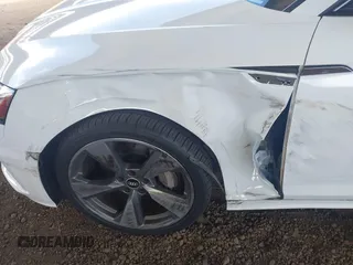 2021 Audi A5 S line Premium Plus z VIN WAUTAAF56MA029485, wystawiony jako IAAI lot #42064786 z przebiegiem 53 808 mil mil oraz . Historia ofert i sprzedaży dostępna na DreamBid. Obrazek 6.