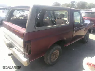 1990 Ford Bronco XL with VIN 1FMEU15N7LLA25223, listed as a IAAI auction lot 41858217 with 196,000 mi miles. Bid and sale history available at carsss.com. Image 4.