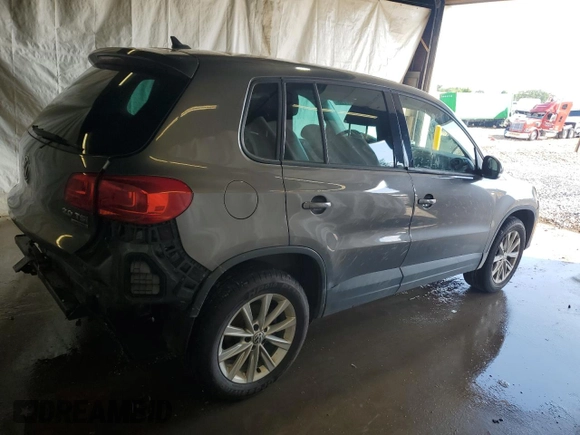 2014 Volkswagen Tiguan SEL with VIN WVGBV3AX2EW541476, listed as a Copart auction lot 64817795 with 158,032 mi miles and Salvage title. Bid and sale history available at DreamBid. Image 3.