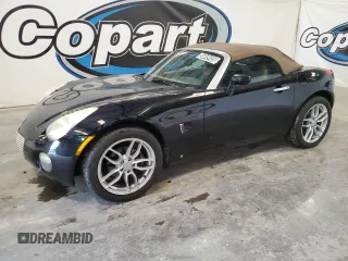 2007 Pontiac Solstice z VIN 1G2MB35B17Y128125, wystawiony jako Copart lot #56049485 z przebiegiem 167 817 mil mil oraz Czysty tytuł • Clean title. Historia ofert i sprzedaży dostępna na DreamBid. Obrazek 1.
