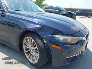 2013 BMW 3 Series 328i with VIN WBA3C1G51DNR49252, listed as a IAAI auction lot 42322739 with 119,421 mi miles and . Bid and sale history available at DreamBid. Image 6.