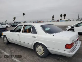 1989 Mercedes-Benz 560 with VIN WDBCA39E2KA479060, listed as a Copart auction lot 81924154 with 172,377 mi miles and Salvage Title. Bid and sale history available at DreamBid. Image 2.