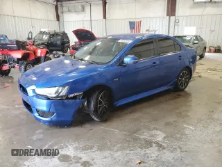 2015 Mitsubishi Lancer SE with VIN JA32V2FW8FU001656, listed as a Copart auction lot 74013154 with 114,552 mi miles and Clean Title. Bid and sale history available at DreamBid. Image 1.