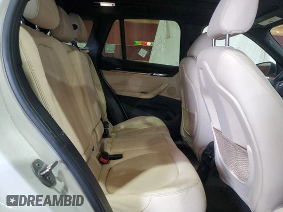 2017 BMW X1 xDrive28i with VIN WBXHT3Z34H4A54811, listed as a Copart auction lot 63584405 with 92,699 mi miles and Salvage title. Bid and sale history available at DreamBid. Image 11.