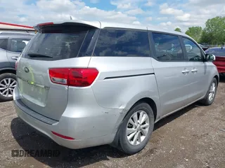2016 Kia Sedona L with VIN KNDMA5C10G6182399, listed as a IAAI auction lot 42186358 with 102,874 mi miles and . Bid and sale history available at DreamBid. Image 4.