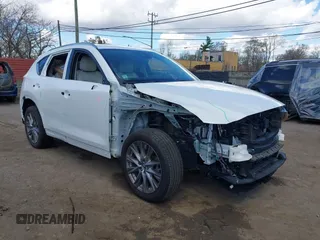 2019 Mazda CX-5 Grand Touring with VIN JM3KFBDM8K1591425, listed as a IAAI auction lot 42074796 with 66,644 mi miles and . Bid and sale history available at DreamBid. Image 1.