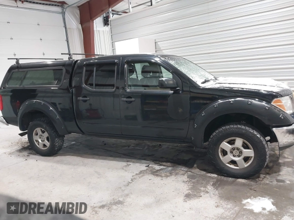2007 Nissan Frontier SE with VIN 1N6AD09W17C447779, listed as a IAAI auction lot 41362259 with 142,153 mi miles. Bid and sale history available at carsss.com. Image 12.