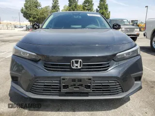 2024 Honda Civic LX z VIN 2HGFE2F23RH572531, wystawiony jako Copart lot #52685515 z przebiegiem 14 750 mil mil oraz Szkoda całkowita • Salvage title. Historia ofert i sprzedaży dostępna na DreamBid. Obrazek 5.