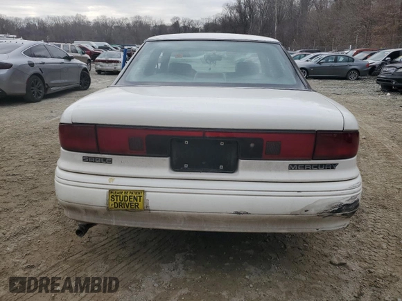 1995 Mercury Sable z VIN 1MELM5345SG617402, wystawiony jako Copart lot #46243165 z przebiegiem 133 262 mil mil oraz Szkody całkowita. Historia ofert i sprzedaży dostępna na DreamBid. Obrazek 6.