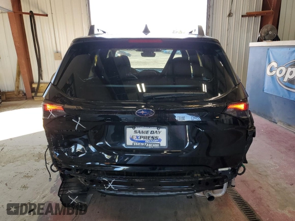 2025 Subaru Forester Premium z VIN JF2SLDBC1SH458876, wystawiony jako Copart lot #57756475 z przebiegiem 57 mil mil oraz Szkoda całkowita • Salvage title. Historia ofert i sprzedaży dostępna na DreamBid. Obrazek 6.