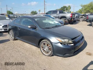 2009 Scion tC with VIN JTKDE167690299075, listed as a IAAI auction lot 40182811 with 204,519 mi miles. Bid and sale history available at carsss.com. Image 1.