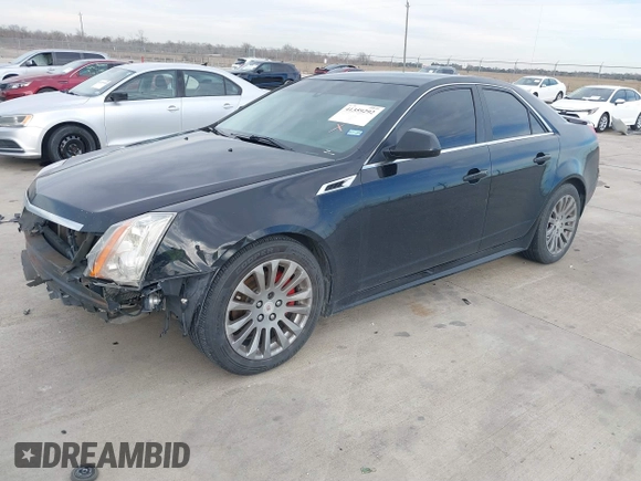 2013 Cadillac CTS Performance with VIN 1G6DJ5E37D0156897, listed as a IAAI auction lot 41359292 with 152,051 mi miles and . Bid and sale history available at DreamBid. Image 2.