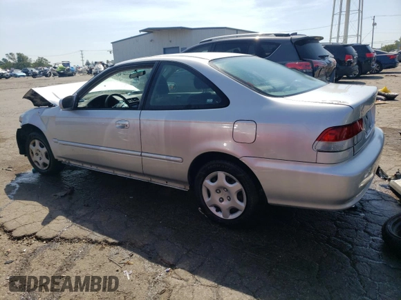 2000 Honda Civic EX with VIN 1HGEJ8240YL059711, listed as a Copart auction lot 69014064 with 144,354 mi miles and Salvage Title. Bid and sale history available at carsss.com. Image 2.