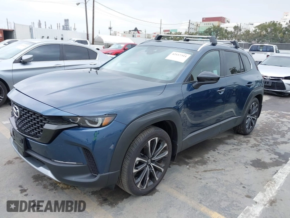 2024 Mazda CX-50 2.5 Turbo with VIN 7MMVABXY1RN237106, listed as a IAAI auction lot 42117311 with 3,135 mi miles and . Bid and sale history available at DreamBid. Image 17.