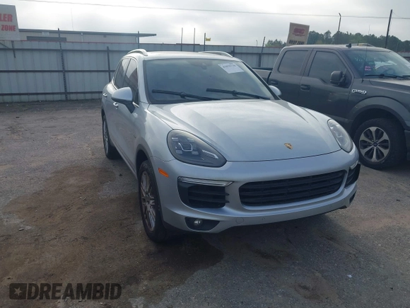 2016 Porsche Cayenne S E-Hybrid with VIN WP1AE2A26GLA59496, listed as a IAAI auction lot 41884022 with 85,386 mi miles and . Bid and sale history available at DreamBid. Image 1.