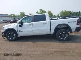 2022 Ram 1500 Rebel with VIN 1C6SRFLT5NN318494, listed as a IAAI auction lot 42413194 with 59,458 mi miles and . Bid and sale history available at DreamBid. Image 14.
