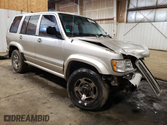 1998 Isuzu Trooper S with VIN JACDJ58X2W7916707, listed as a Copart auction lot 54154335 with 167,433 mi miles and Salvage title. Bid and sale history available at DreamBid. Image 4.