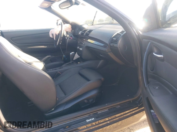 2011 BMW 1 Series 128i with VIN WBAUL7C54BVM80474, listed as a IAAI auction lot 42031032 with 76,617 mi miles and . Bid and sale history available at carsss.com. Image 5.