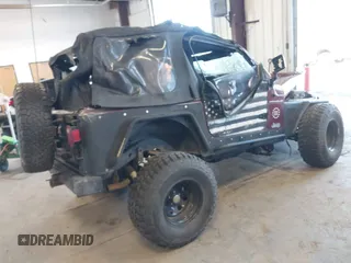2001 Jeep Wrangler SE with VIN 1J4FA29P01P372136, listed as a IAAI auction lot 42013962 with 163,732 mi miles and . Bid and sale history available at DreamBid. Image 4.