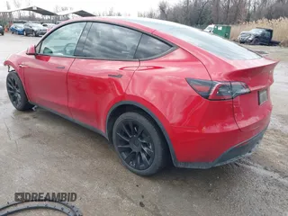 2023 Tesla Model Y Long Range with VIN 7SAYGDEE1PA169031, listed as a IAAI auction lot 41660766 with 35,253 mi miles and . Bid and sale history available at DreamBid. Image 3.