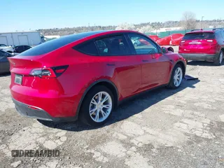 2021 Tesla Model Y Standard Range with VIN 5YJYGDED1MF111410, listed as a IAAI auction lot 41942323 with 24,836 mi miles. Bid and sale history available at carsss.com. Image 4.