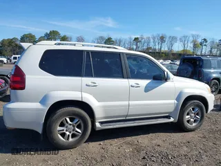 2003 Lexus GX 470 with VIN JTJBT20X130019750, listed as a IAAI auction lot 42045337 with 222,485 mi miles. Bid and sale history available at carsss.com. Image 13.