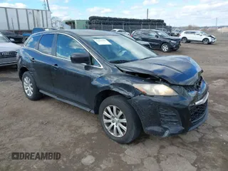 2011 Mazda CX-7 i Sport with VIN JM3ER2B58B0390971, listed as a IAAI auction lot 41694565 with 124,456 mi miles. Bid and sale history available at carsss.com. Image 1.