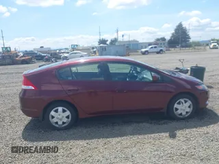 2011 Honda Insight LX z VIN JHMZE2H51BS004312, wystawiony jako IAAI lot #42086422 z przebiegiem 72 814 mil mil oraz . Historia ofert i sprzedaży dostępna na DreamBid. Obrazek 13.