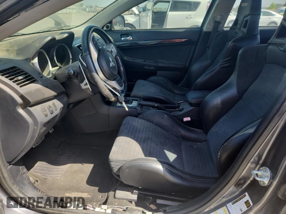 2008 Mitsubishi Lancer Evolution MR z VIN JA3AW56V28U051733, wystawiony jako Copart lot #56241085 z przebiegiem 117 272 mil mil oraz Czysty tytuł • Clean title. Historia ofert i sprzedaży dostępna na DreamBid. Obrazek 7.