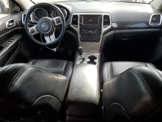 2011 Jeep Grand Cherokee Laredo z VIN 1J4RR4GG1BC506083, wystawiony jako Copart lot #58498295 z przebiegiem 122 847 mil mil oraz Czysty tytuł • Clean title. Historia ofert i sprzedaży dostępna na DreamBid. Obrazek 8.