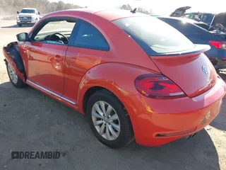 2019 Volkswagen Beetle S with VIN 3VWFD7AT7KM719940, listed as a IAAI auction lot 41190839 with 77,627 mi miles. Bid and sale history available at carsss.com. Image 3.