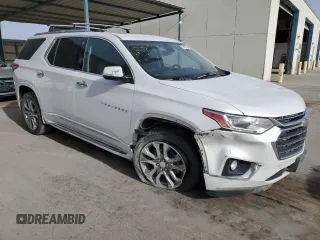 2019 Chevrolet Traverse Premier with VIN 1GNERKKW3KJ147054, listed as a Copart auction lot 59191225 with 112,436 mi miles and Salvage title. Bid and sale history available at DreamBid. Image 4.