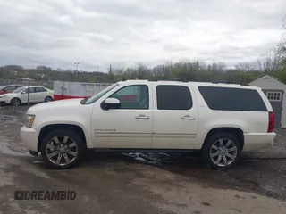 2010 Chevrolet Suburban LTZ with VIN 1GNUKKE35AR129351, listed as a IAAI auction lot 41971625 with 234,487 mi miles. Bid and sale history available at carsss.com. Image 14.