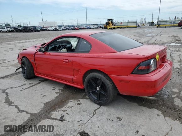 1996 Ford Mustang GT with VIN 1FALP42X4TF131093, listed as a Copart auction lot 61013915 with 158,297 mi miles and Salvage title. Bid and sale history available at DreamBid. Image 2.