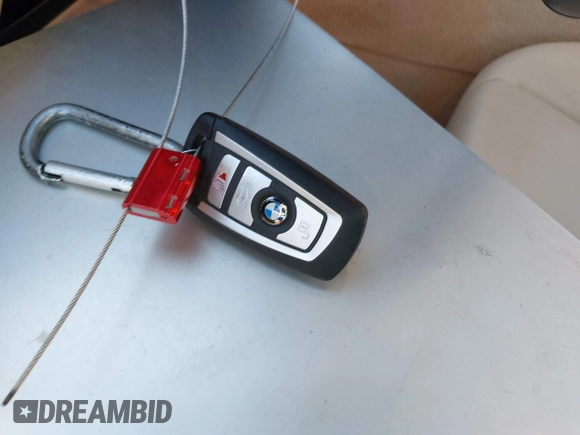 2013 BMW 5 Series 528i with VIN WBAXG5C58DD234056, listed as a IAAI auction lot 41833721 with 102,730 mi miles and . Bid and sale history available at DreamBid. Image 11.