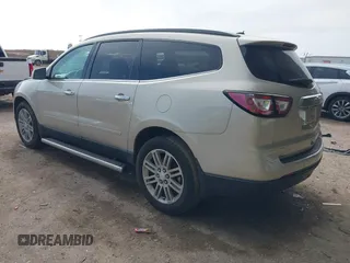 2015 Chevrolet Traverse LT with VIN 1GNKVGKD1FJ295946, listed as a IAAI auction lot 41519933 with 156,997 mi miles and . Bid and sale history available at DreamBid. Image 3.