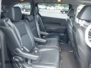 2022 Honda Odyssey Touring с VIN 5FNRL6H86NB026316, выставлен на аукционе IAAI как лот 42611106 с пробегом 75 427 миль миль и . История ставок и продаж доступна на DreamBid. Изображение 8.