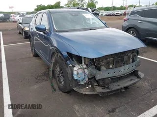 2020 Mazda CX-5 Touring z VIN JM3KFACM8L0793166, wystawiony jako IAAI lot #42268375 z przebiegiem 79 697 mil mil oraz . Historia ofert i sprzedaży dostępna na DreamBid. Obrazek 1.