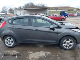 2015 Ford Fiesta SE with VIN 3FADP4EJ0FM117739, listed as a IAAI auction lot 41795558 with 111,000 mi miles. Bid and sale history available at carsss.com. Image 13.