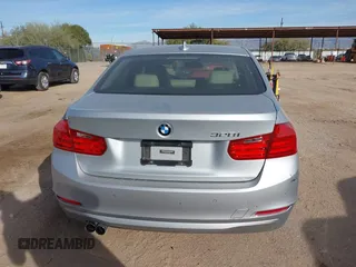 2015 BMW 3 Series 328i with VIN WBA3A5C58FF610035, listed as a IAAI auction lot 40986949 with 73,083 mi miles. Bid and sale history available at carsss.com. Image 16.