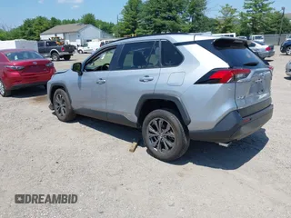 2022 Toyota RAV4 Hybrid XLE Premium with VIN JTMB6RFV1ND063963, listed as a IAAI auction lot 42550907 with 35,012 mi miles and . Bid and sale history available at DreamBid. Image 3.