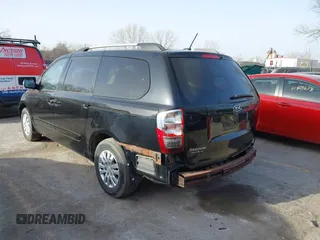 2011 Kia Sedona LX with VIN KNDMG4C70B6411556, listed as a IAAI auction lot 41768777 with 124,180 mi miles. Bid and sale history available at carsss.com. Image 3.