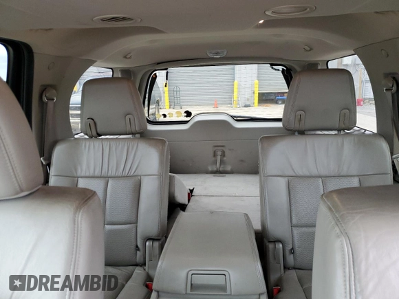2013 Lincoln Navigator z VIN 5LMJJ2H54DEL06648, wystawiony jako Copart lot #47975275 z przebiegiem 189 591 mil mil oraz Szkoda całkowita • Salvage title. Historia ofert i sprzedaży dostępna na DreamBid. Obrazek 10.