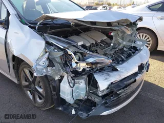 2019 Toyota Prius L Eco with VIN JTDKARFU0K3097075, listed as a IAAI auction lot 41751482 with 16,558 mi miles. Bid and sale history available at carsss.com. Image 6.