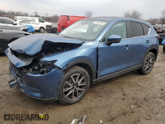 2018 Mazda CX-5 Touring with VIN JM3KFBCM0J0363036, listed as a Copart auction lot 47085755 with 61,928 mi miles and Salvage Title. Bid and sale history available at DreamBid. Image 1.