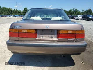 1991 Honda Accord z VIN 1HGCB7657MA200443, wystawiony jako Copart lot #67918464 z przebiegiem 94 601 mil mil oraz Szkoda całkowita • Salvage title. Historia ofert i sprzedaży dostępna na DreamBid. Obrazek 6.