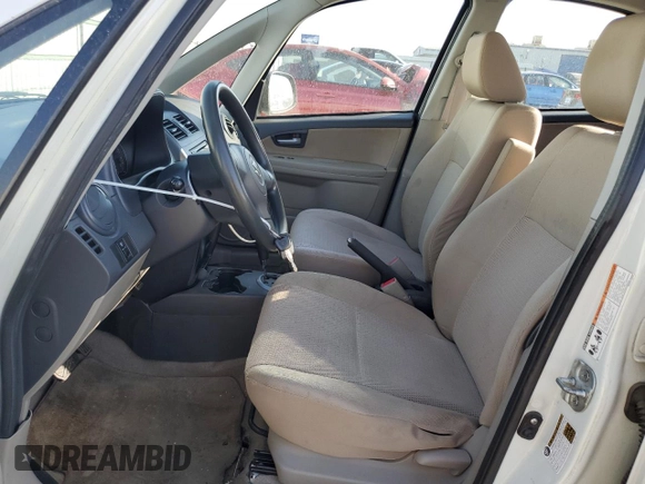 2009 Suzuki SX4 Man FWD with VIN JS2YC412796200908, listed as a Copart auction lot 73821924 with 125,721 mi miles and Salvage Title. Bid and sale history available at carsss.com. Image 7.