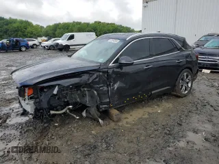 2023 Genesis GV70 Advanced с VIN 5NMMCET14PH000281, выставлен на аукционе Copart как лот 57876395 с пробегом 24 842 миль миль и Списание • Salvage title. История ставок и продаж доступна на DreamBid. Изображение 1.