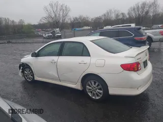 2010 Toyota Corolla with VIN 2T1BU4EEXAC413978, listed as a IAAI auction lot 41953898 with 121,676 mi miles. Bid and sale history available at carsss.com. Image 15.